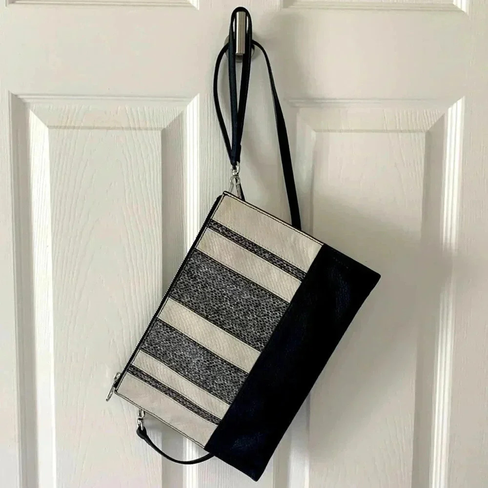 Vince Camuto Convertible crossbody to clutch/Wristlet black & white leather bag